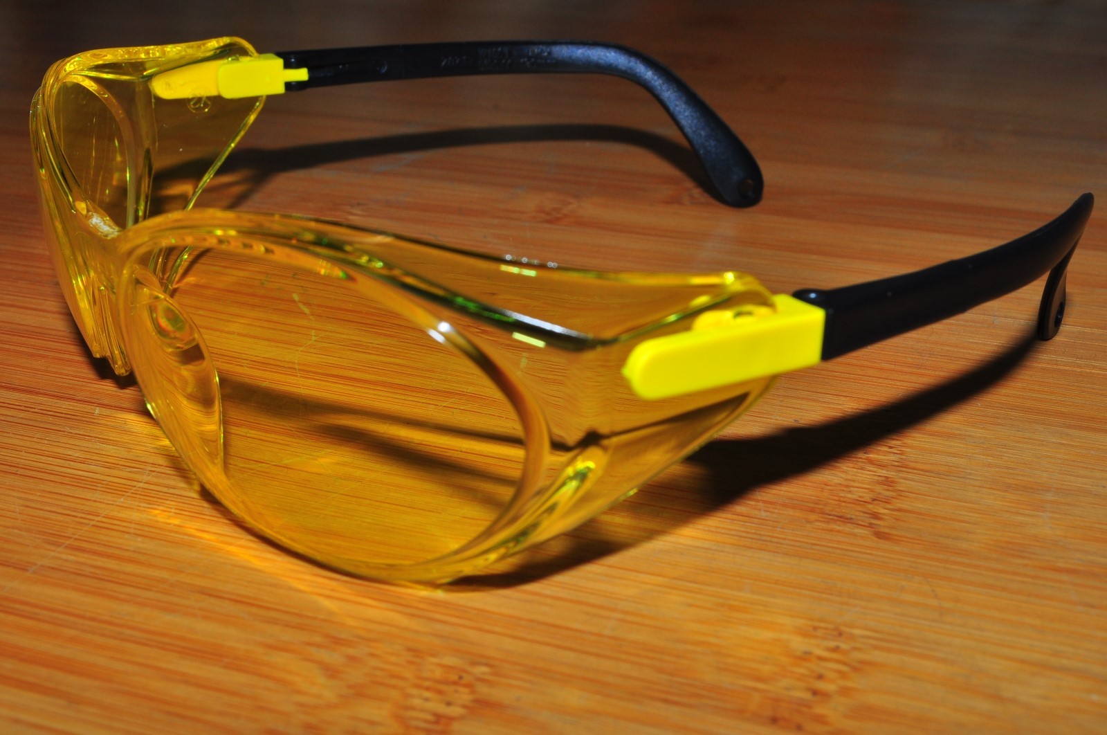 Uvex Eyewear Safety Sun Glasses Bandido S1722 Hot Yell  Black Frame Amber lens