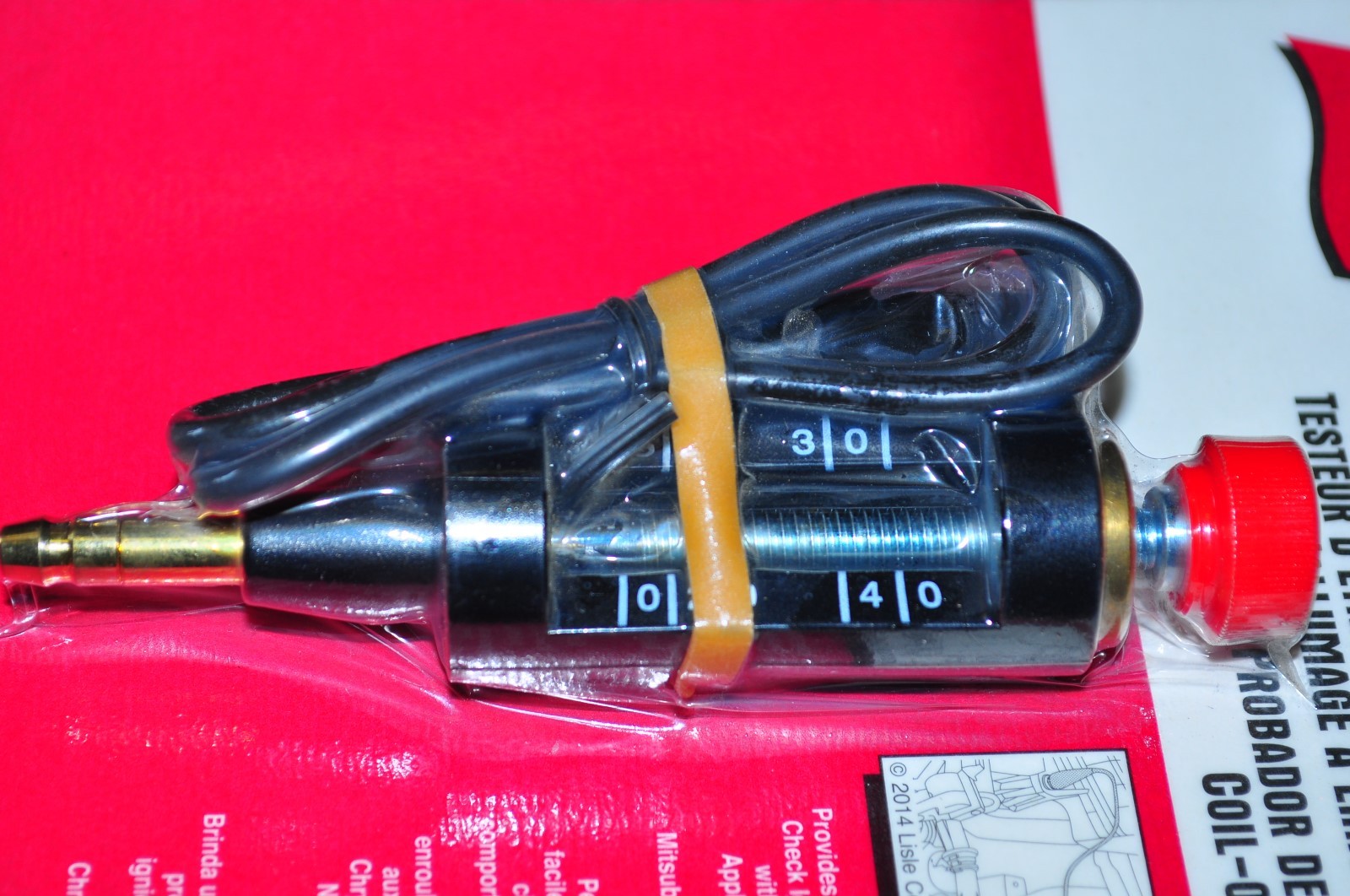 Coil-On-Plug Spark Tester read the gap measurement from 0 to 40k.Lisle 20700